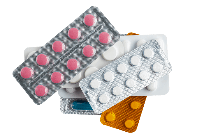Plastic pill packaging highlighting its essential role in healthcare and the challenge of plastic waste.