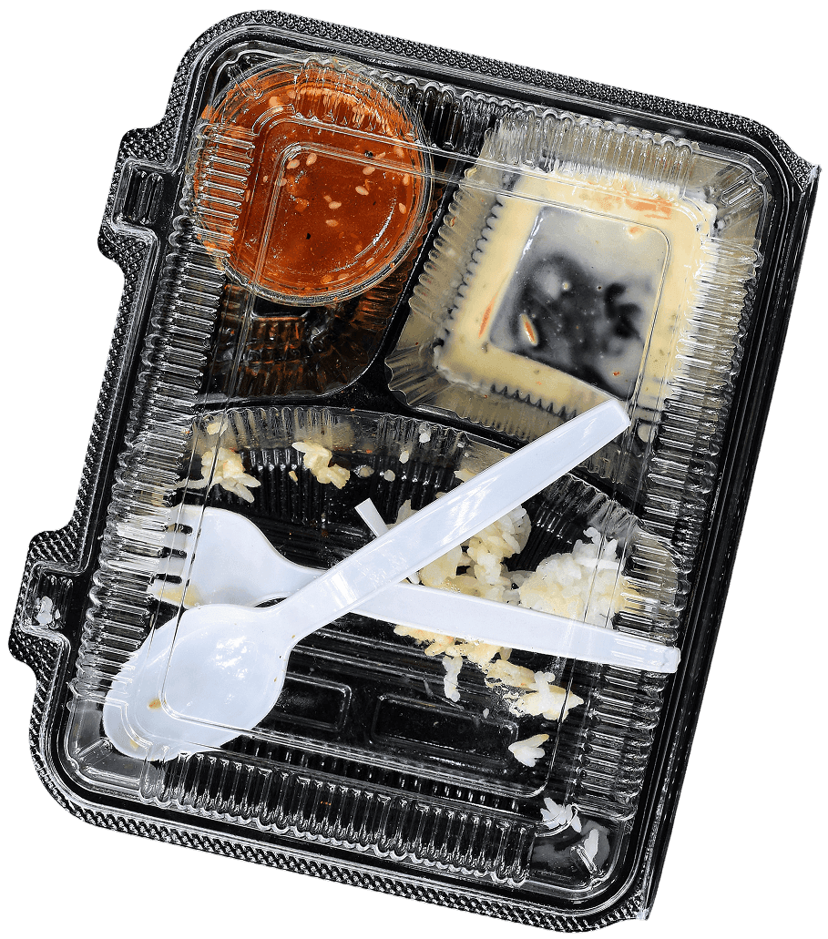 Used plastic food container and utensils highlighting challenges in recycling and need for reuse solutions.