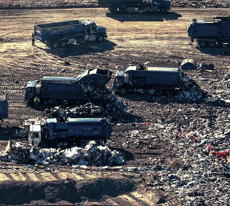 Trucks at a landfill show how plastic waste breaks down, leading to the food we consume.